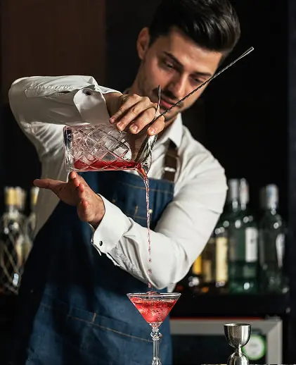 bar waiter serving a cocktail